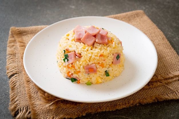 homemade fried rice with ham on plate