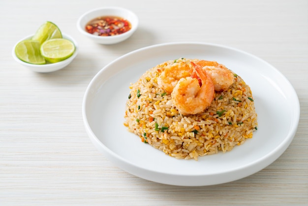 Homemade fried shrimps fried rice on plate in Thai style Asian food style