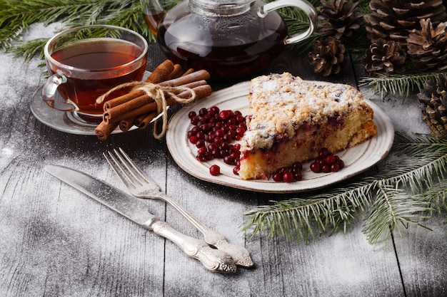 homemade fruit pie sprinkled with sugar powder