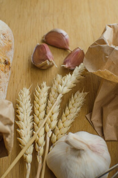 Homemade garlic nut bread on a dark wooden background