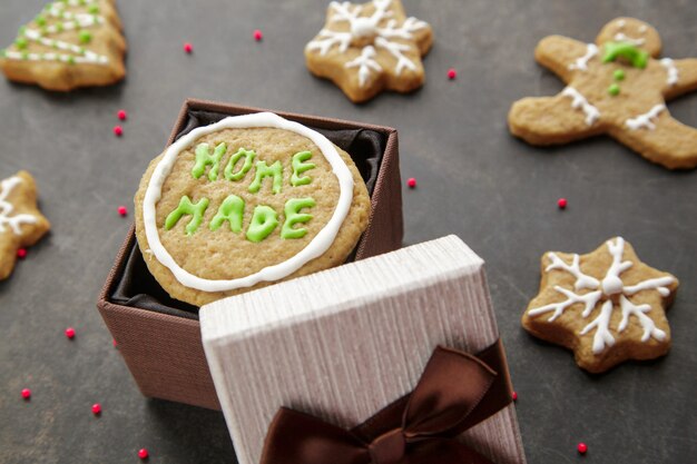 Homemade ginger glazed cookies into the brown gift box good present for Christ Gluten free cookies