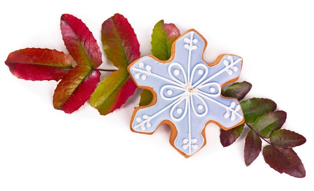 Homemade gingerbread cookies, festive Christmas and New Year sweets in the form of blue snow flakes background card isolated on white background.