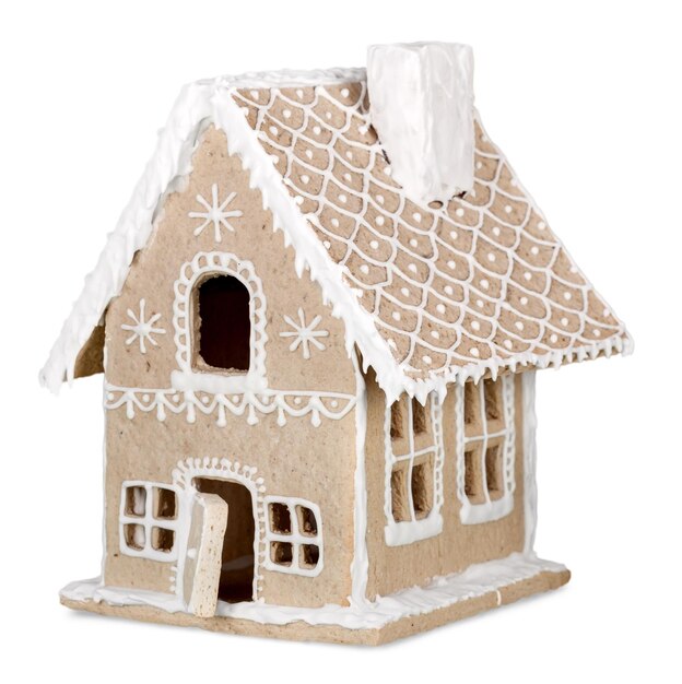 Homemade gingerbread house on brown background