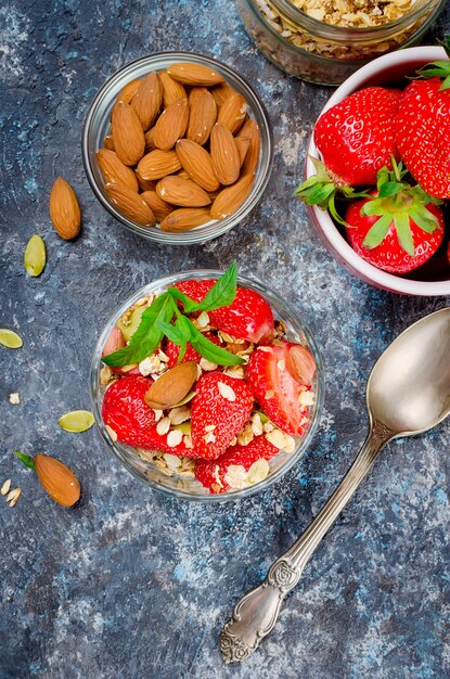 Homemade  granola with fresh strawberries 