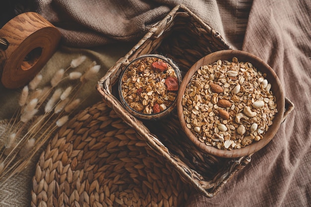 Homemade granola in a wooden bowl top view