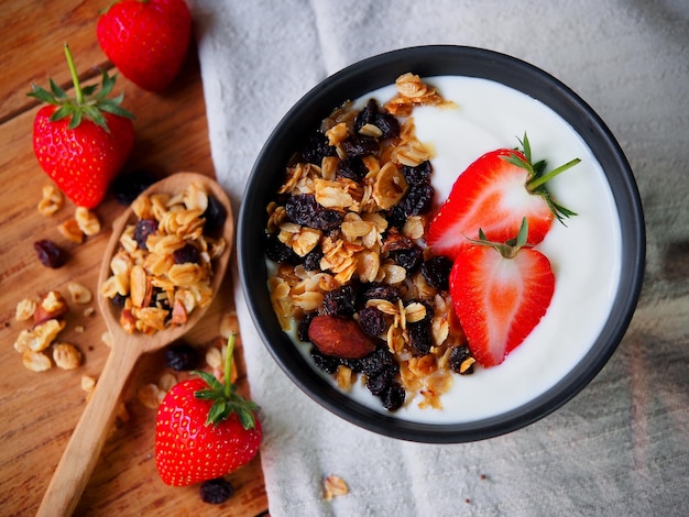 Homemade granola yogurt and strawberry for healthy breakfast