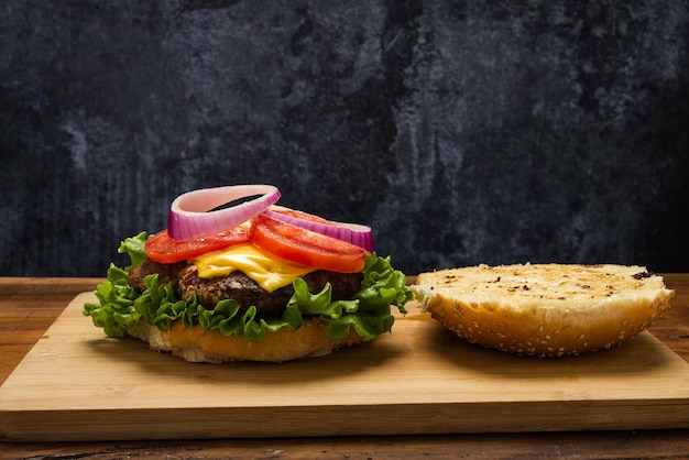 Homemade hamburger on a wooden table