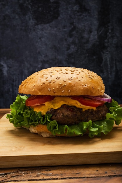 Homemade hamburger on a wooden table