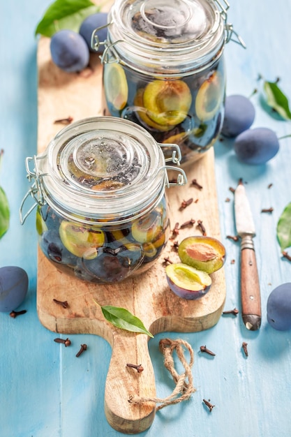 Homemade and healthy pickled plums in sugar and vinegar