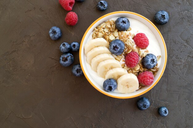 Homemade healthy yogurt with muesli and blueberries.