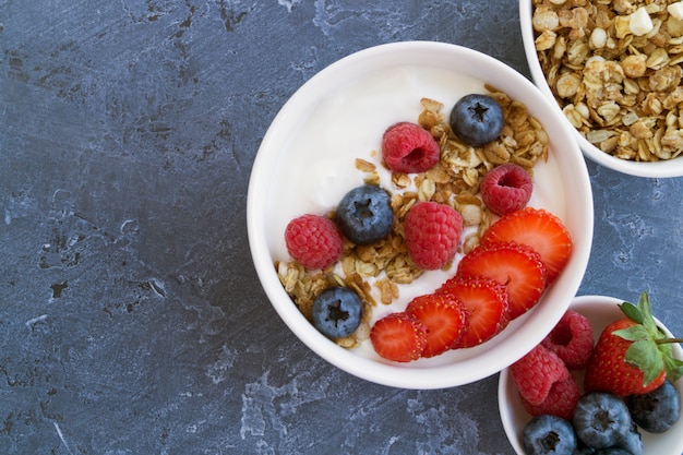 Homemade healthy yogurt with muesli and blueberries.