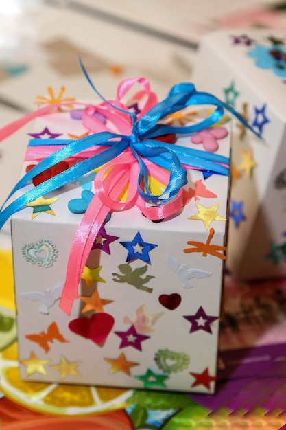 Photo homemade holiday packaging with bows and stars