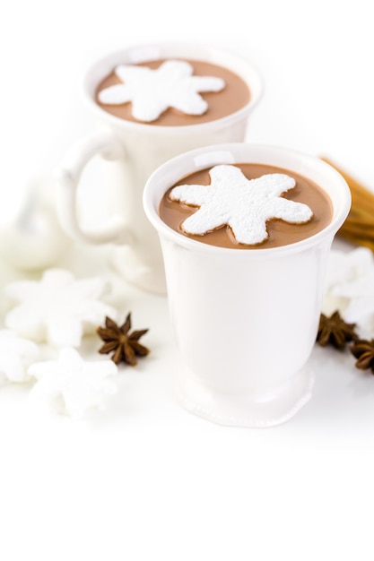 Homemade hot chocolate garnished with snowflake shaped white marshmallows.