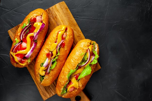 homemade hot dogs on a stone background  with copy space for your test