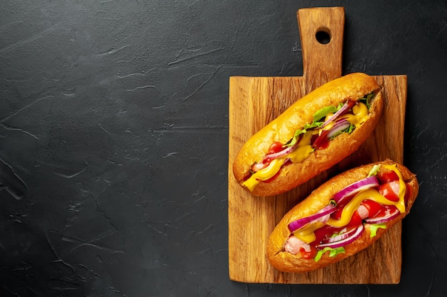 homemade hot dogs on a stone background  with copy space for your test