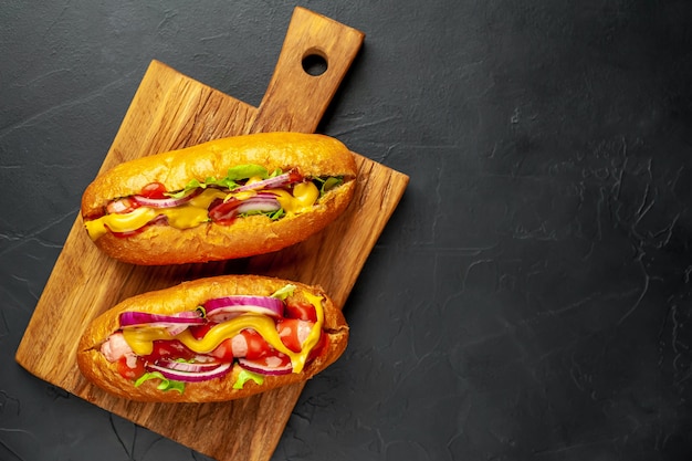 homemade hot dogs on a stone background  with copy space for your test