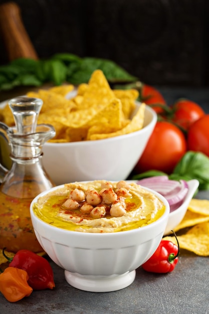 Homemade hummus in a white bowl