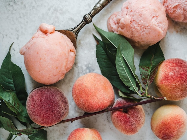 Homemade ice cream and ripe juicy peaches