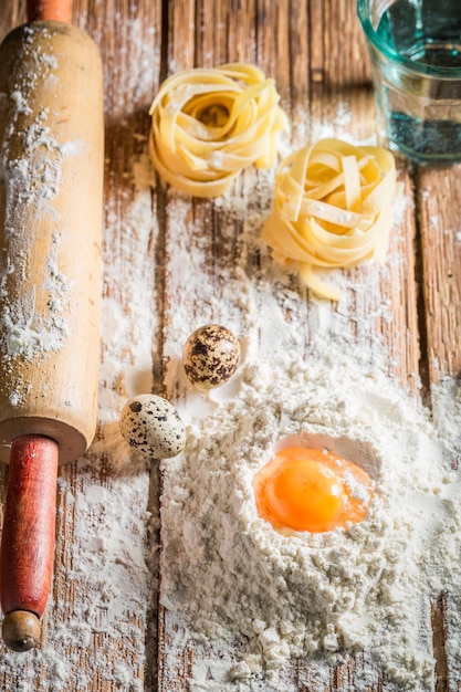 Homemade ingredients for pasta with eggs and flour
