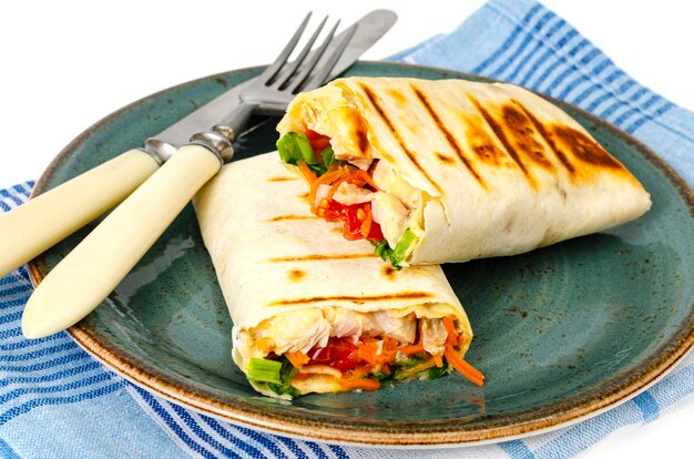 Homemade lavash, shawarma with vegetables, chicken. Studio Photo