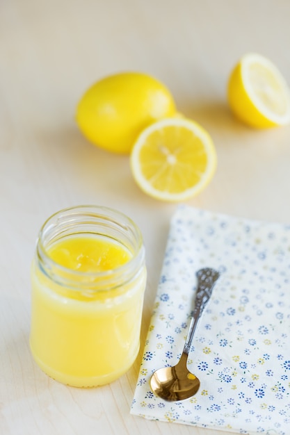 Homemade lemon curd in glass jar