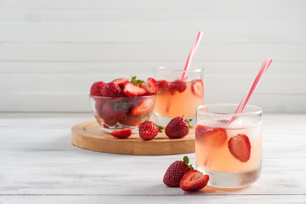 Homemade lemonade from strawberry, refreshig beverage in glass