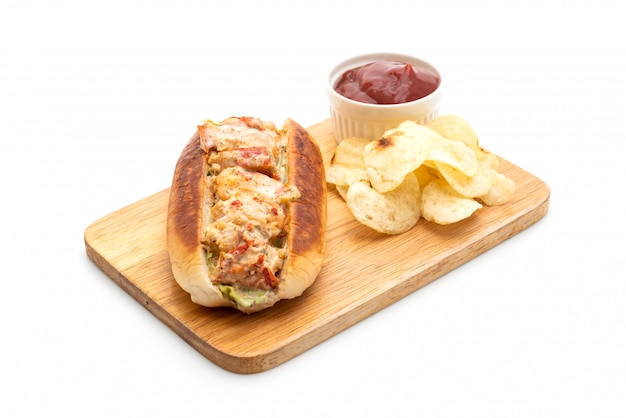 homemade lobster roll with potato chips