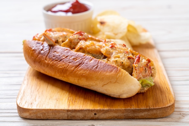 homemade lobster roll with potato chips