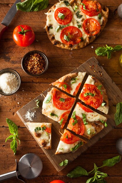 Homemade Margarita Flatbread Pizza with Tomato and Basil