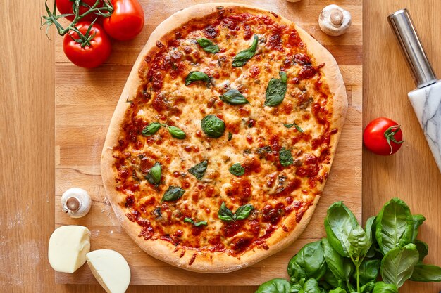 Homemade Margarita Flatbread Pizza with Tomato and Basil.