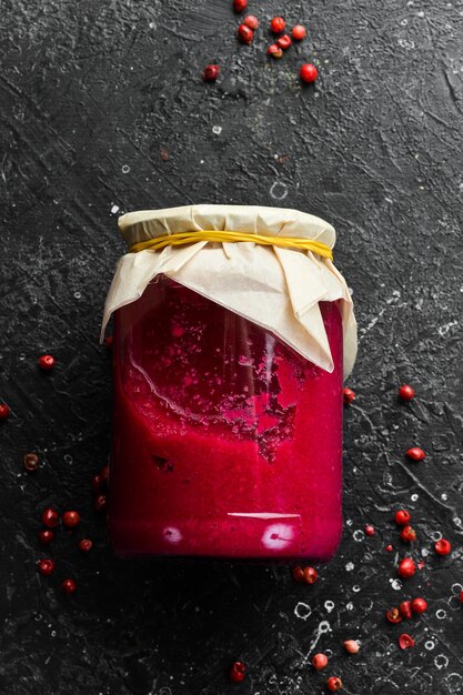 Homemade Marinated Beetroot and Horseradish Pasta in a Glass Jar Ukrainian cuisine Food supplies Top view