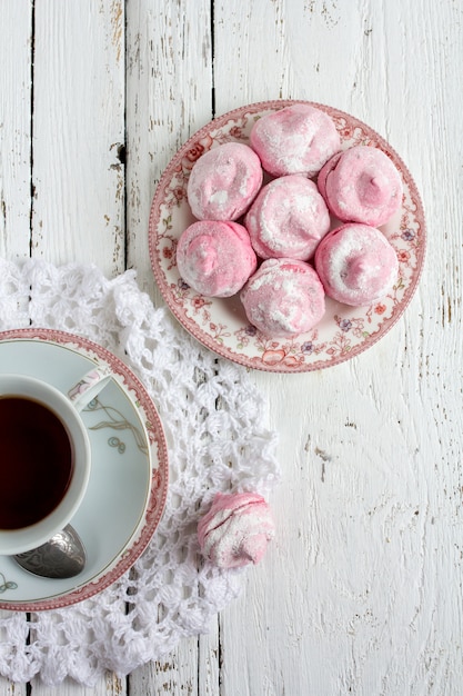 Homemade marshmallows  zephyr with cup of tea 