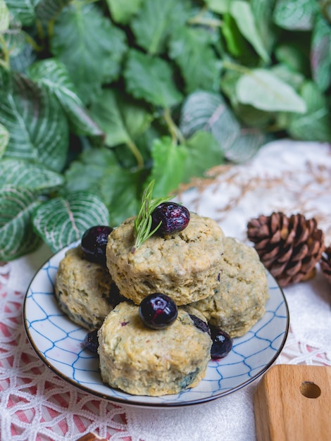 Homemade matcha green tea scones set on table.