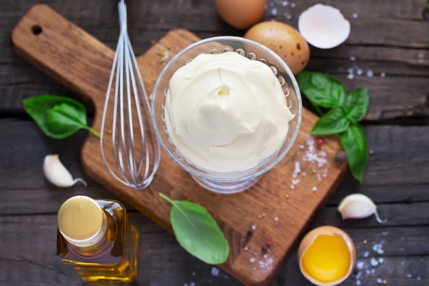 Homemade mayonnaise sauce and ingredients