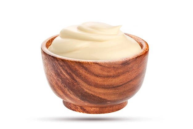 Photo homemade mayonnaise sauce in wooden bowl