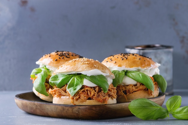 Homemade mini burgers with pulled chicken