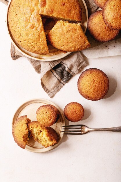 Homemade muffins on white texture background. Top view, flat lay. Copy space