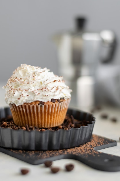 Homemade muffins with coffee and cinnamon