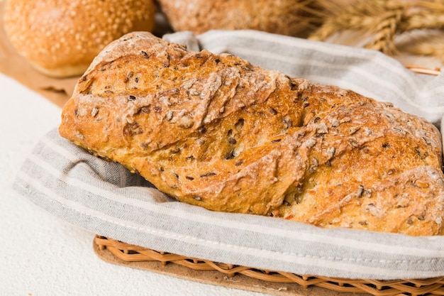 Homemade natural breads Different kinds of fresh bread as background perspective view with copy space