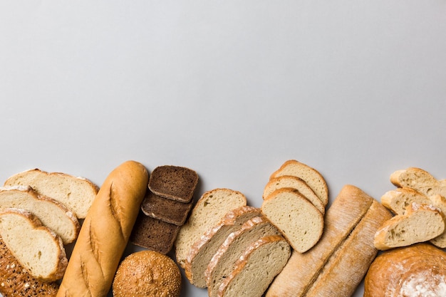 Homemade natural breads Different kinds of fresh bread as background top view with copy space