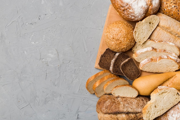 Homemade natural breads Different kinds of fresh bread as background top view with copy space