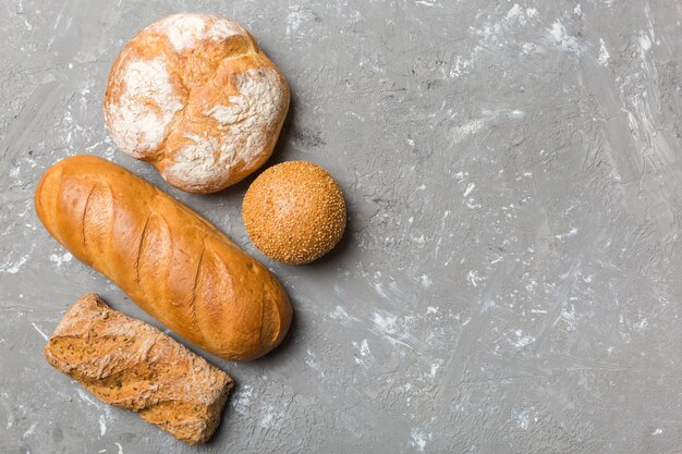 Homemade natural breads Different kinds of fresh bread as background top view with copy space