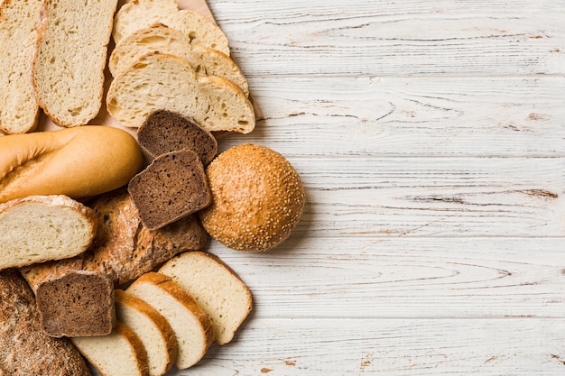 Homemade natural breads Different kinds of fresh bread as background top view with copy space