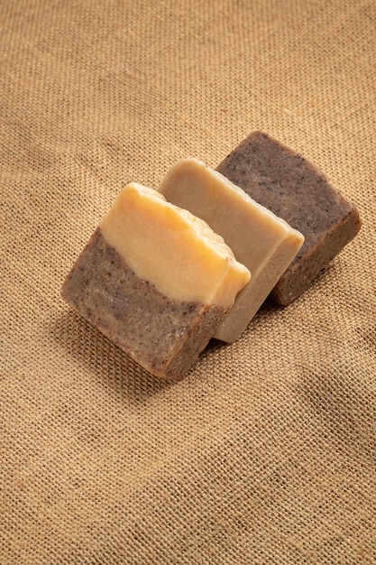 Homemade natural soap on earth tone background