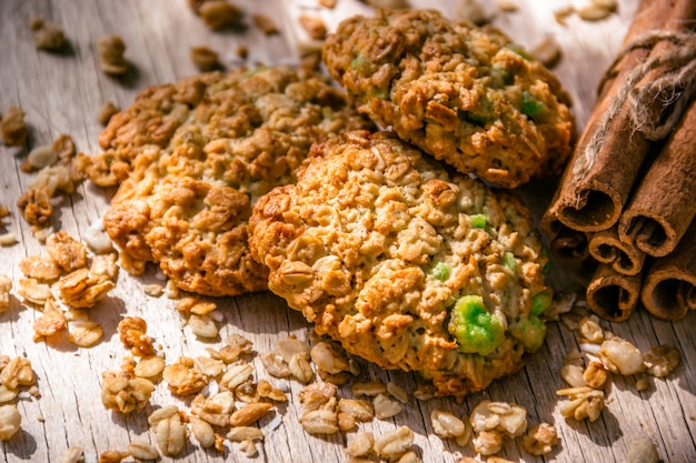 Homemade oatmeal cookies and cinnamon sticks