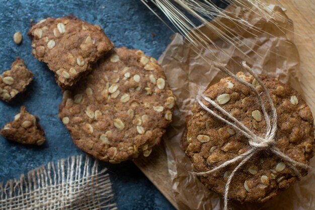 Homemade oatmeal fitness cookies on wooden board