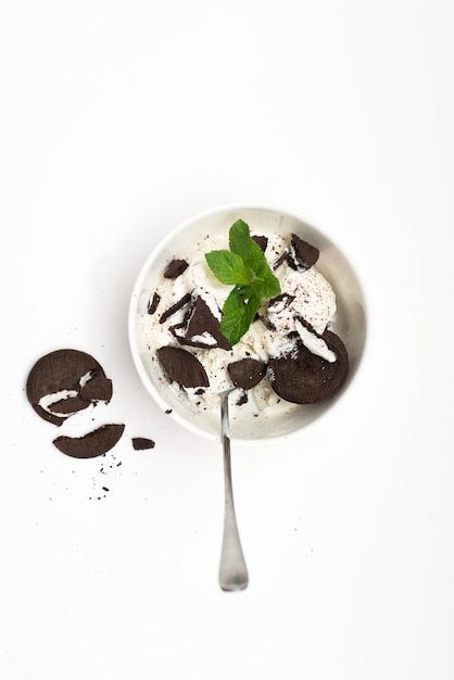 Homemade organic ice cream with chocolate chips, chocolate cookies and mint