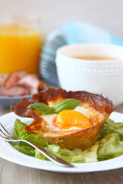 Homemade pancake baskets with egg and mushrooms