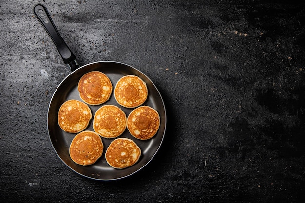 Homemade pancakes in a frying pan