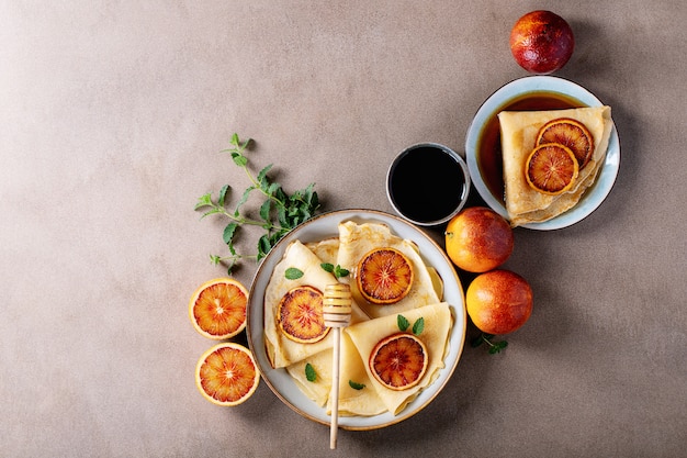 Homemade pancakes with blood oranges